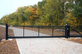 Black cantilever sliding gate at a rural site entrance