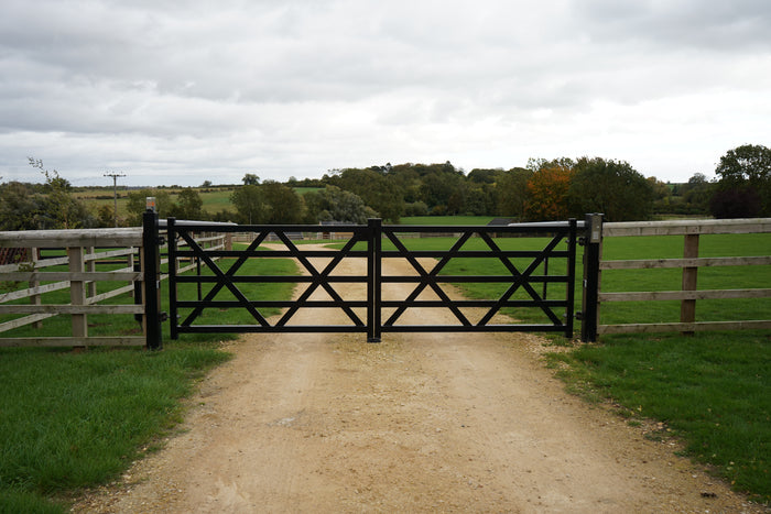 EstateGuard five-bar style automated double swing gates across a rural track