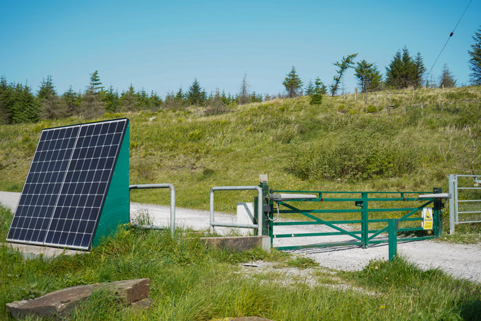 Gated rural site entrance in open countryside